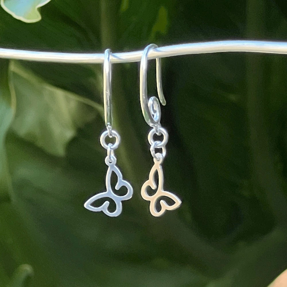 Crafted from premium quality sterling silver, these earrings boast a striking swirl earring hook design that gracefully adds a touch of movement to the piece. The hooks are easy to insert and secure, ensuring a comfortable and hassle-free wearing experience. The stunning swirl earring hook adds a touch of unique and modern flair, while the butterfly symbolises transformation, growth, and the beauty of nature, making it an excellent addition to any jewellery collection.