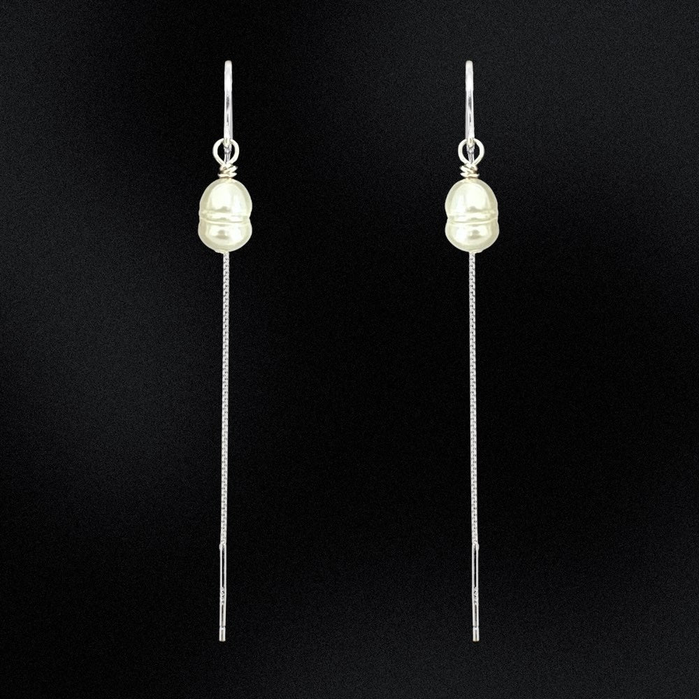 These Freshwater Pearl Threader Earrings are a stunning addition to any jewellery collection! Handcrafted in Australia with sterling silver, these earrings are perfect for any occasion. Exquisite, sophisticated, and stylish, these earrings will add a luxurious sparkle to any ensemble! S925 Sterling Silver Tarnish Free Hypoallergenic Water Resistant Long Lasting