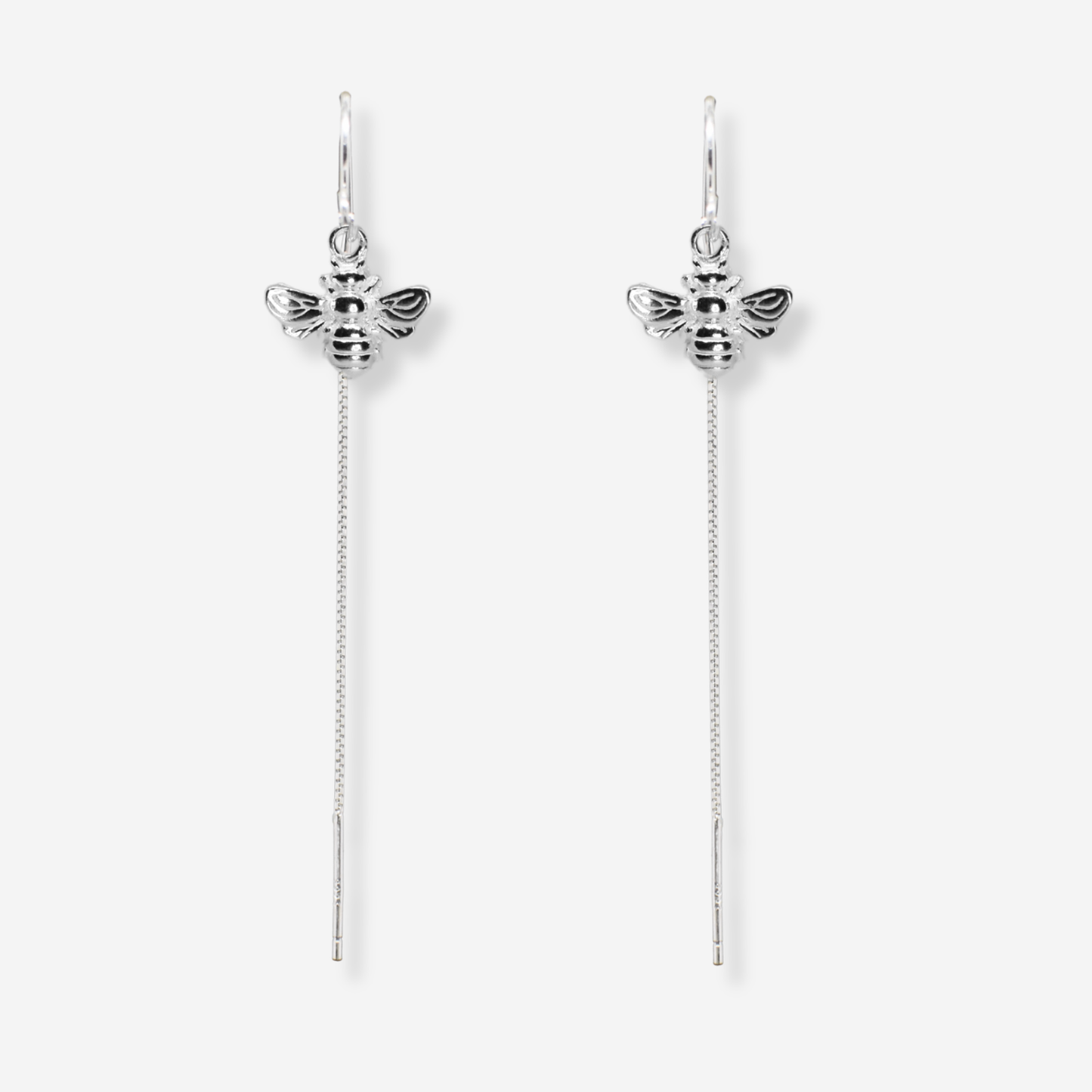 Silver bee earrings with chain drops on a white background