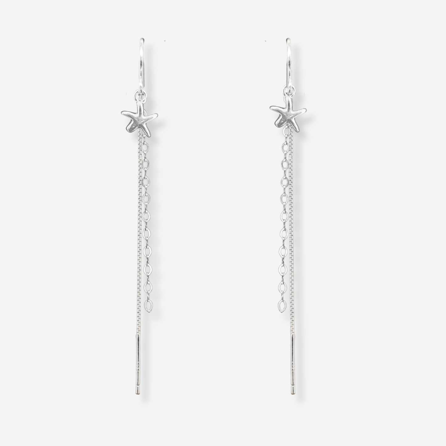 Silver starfish chain earrings on a light gray background