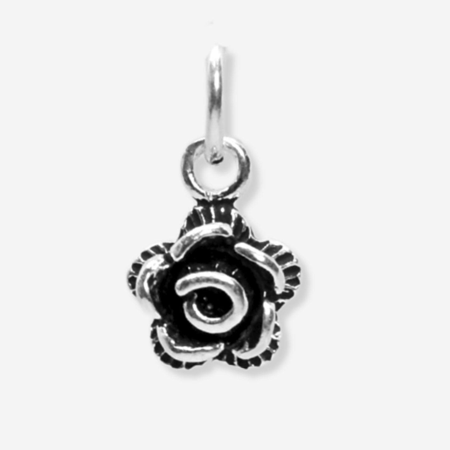 Silver rose-shaped pendant on a white background
