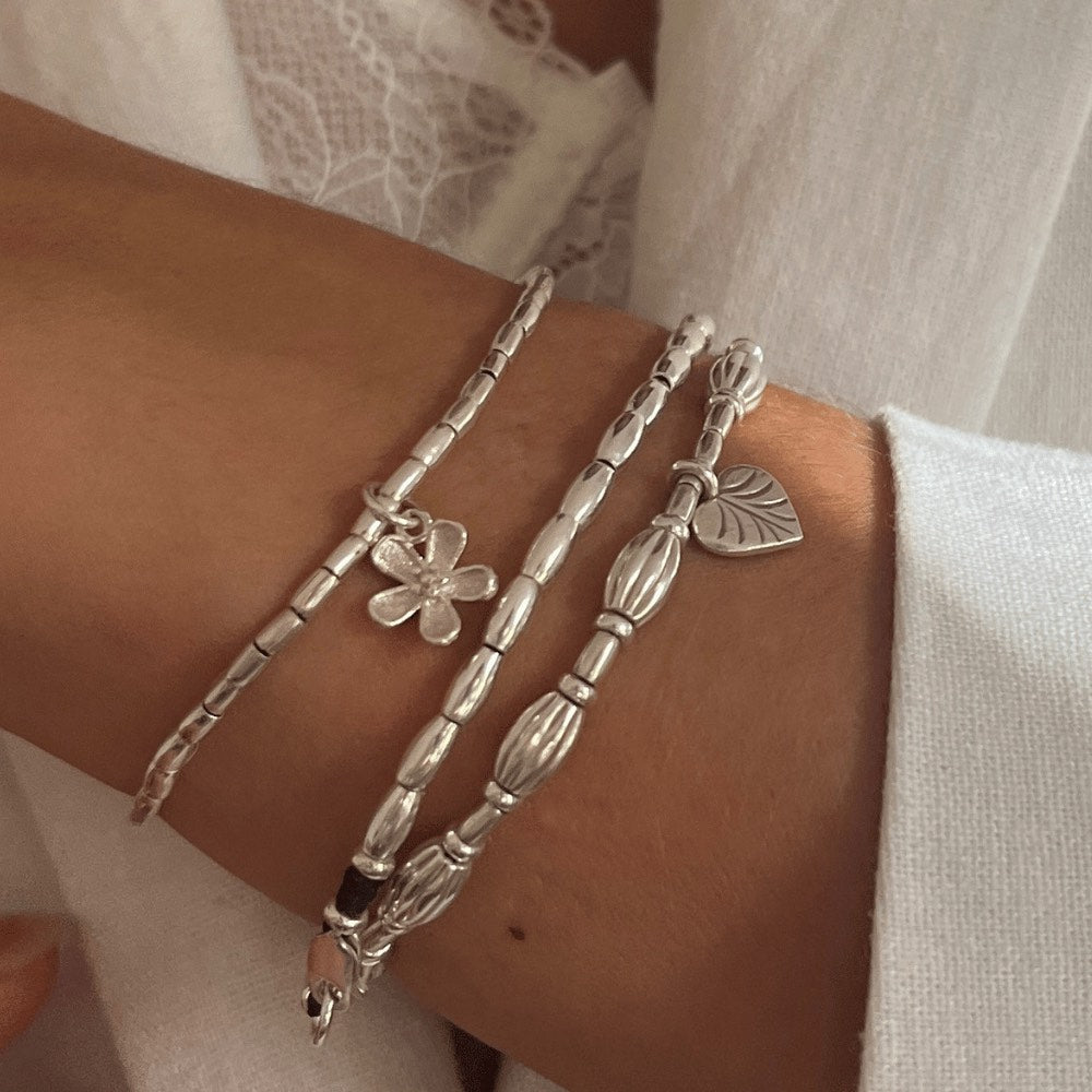 Are you looking for the perfect piece of jewellery to add to your collection? Look no further than our customisable bracelet with Hill Tribe silver beads! Each bracelet features stunning Hill Tribe silver beads, expertly crafted by the skilled artisans of Northern Thailand. But the real beauty of this bracelet lies in its ability to be personalised to your taste.