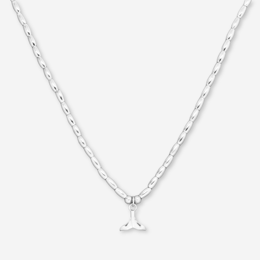 Silver necklace with a small pendant on a white background