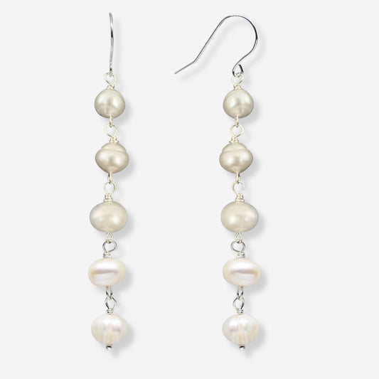 Pearl drop earrings on a white background