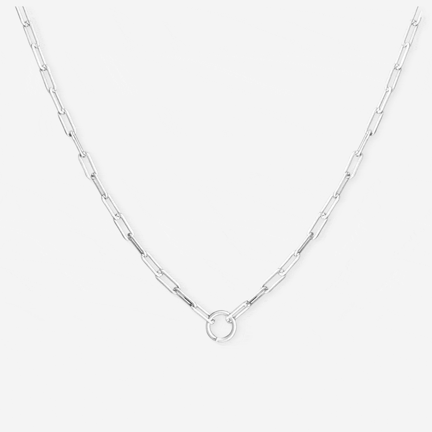 silver chain necklace with charms on white background