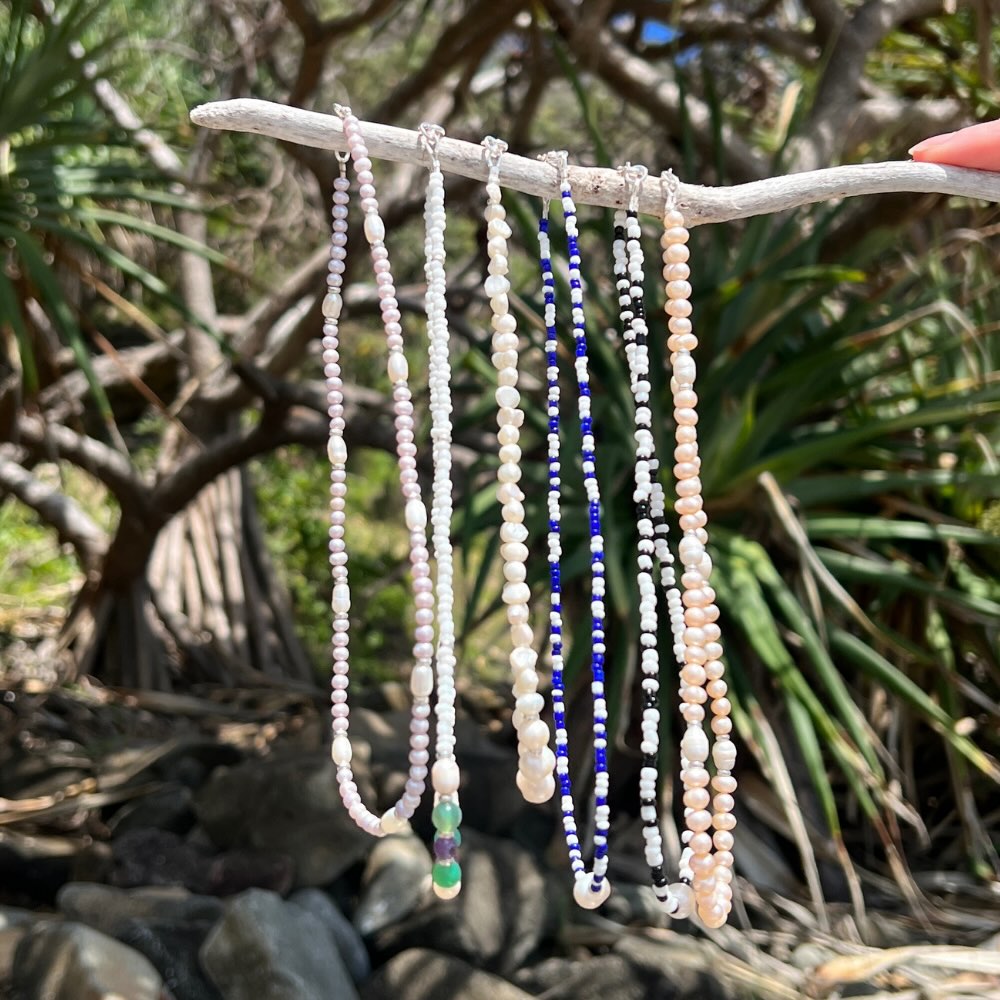 Be summer-ready with this handmade Apricot Freshwater Pearl Beaded Choker Necklace, crafted in Australia. Make a lasting impression with this stunning piece, perfect for any occasion and sure to turn heads. A must-have addition to your jewellery collection!