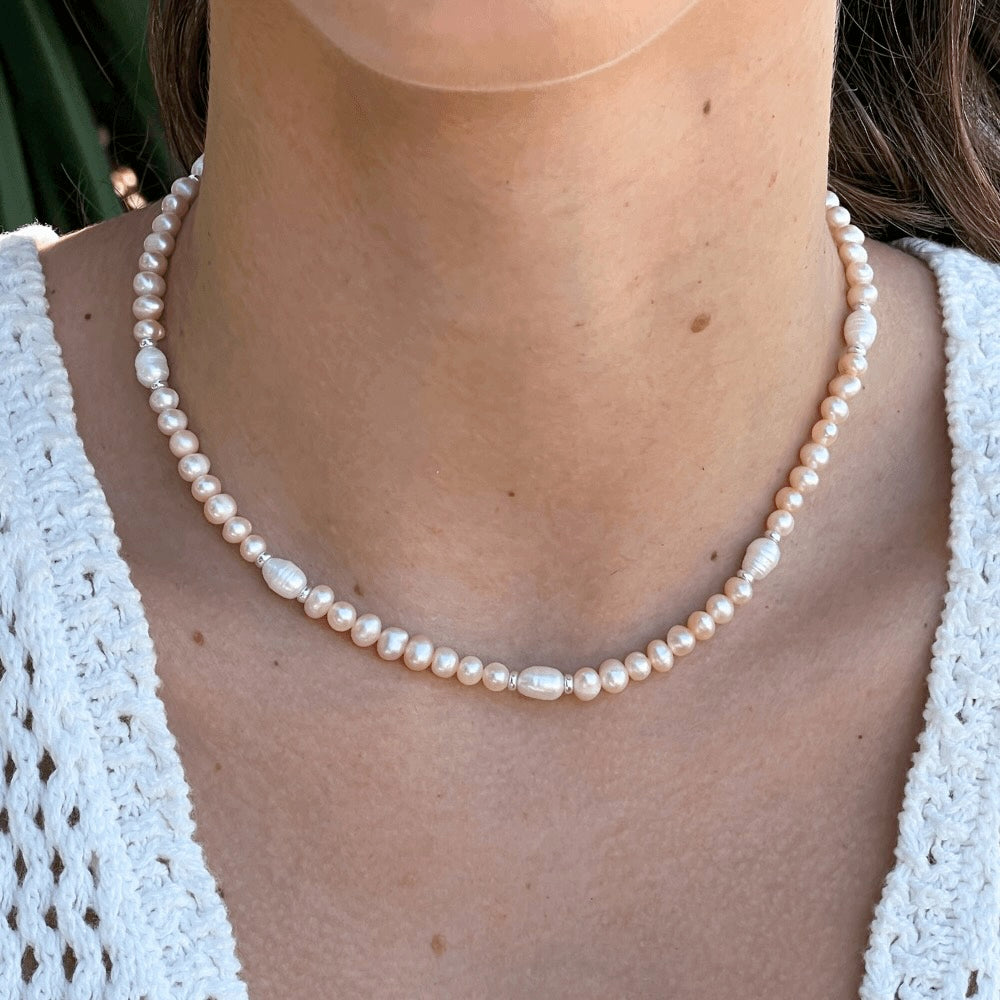 Be summer-ready with this handmade Apricot Freshwater Pearl Beaded Choker Necklace, crafted in Australia. Make a lasting impression with this stunning piece, perfect for any occasion and sure to turn heads. A must-have addition to your jewellery collection!