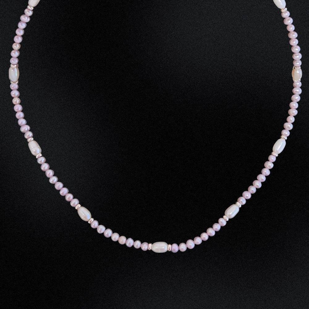 Let the brilliance of handmade craftsmanship help you celebrate summer with this Lavender Freshwater Pearl Beaded Choker! Featuring chic beads and a captivatingly luminous finish, it’s a simply divine addition to any evening ensemble. Show off your style and charm with this one-of-a-kind piece from Australia!