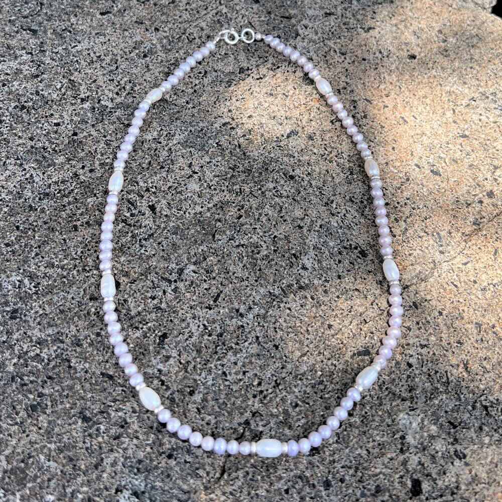 Let the brilliance of handmade craftsmanship help you celebrate summer with this Lavender Freshwater Pearl Beaded Choker! Featuring chic beads and a captivatingly luminous finish, it’s a simply divine addition to any evening ensemble. Show off your style and charm with this one-of-a-kind piece from Australia!