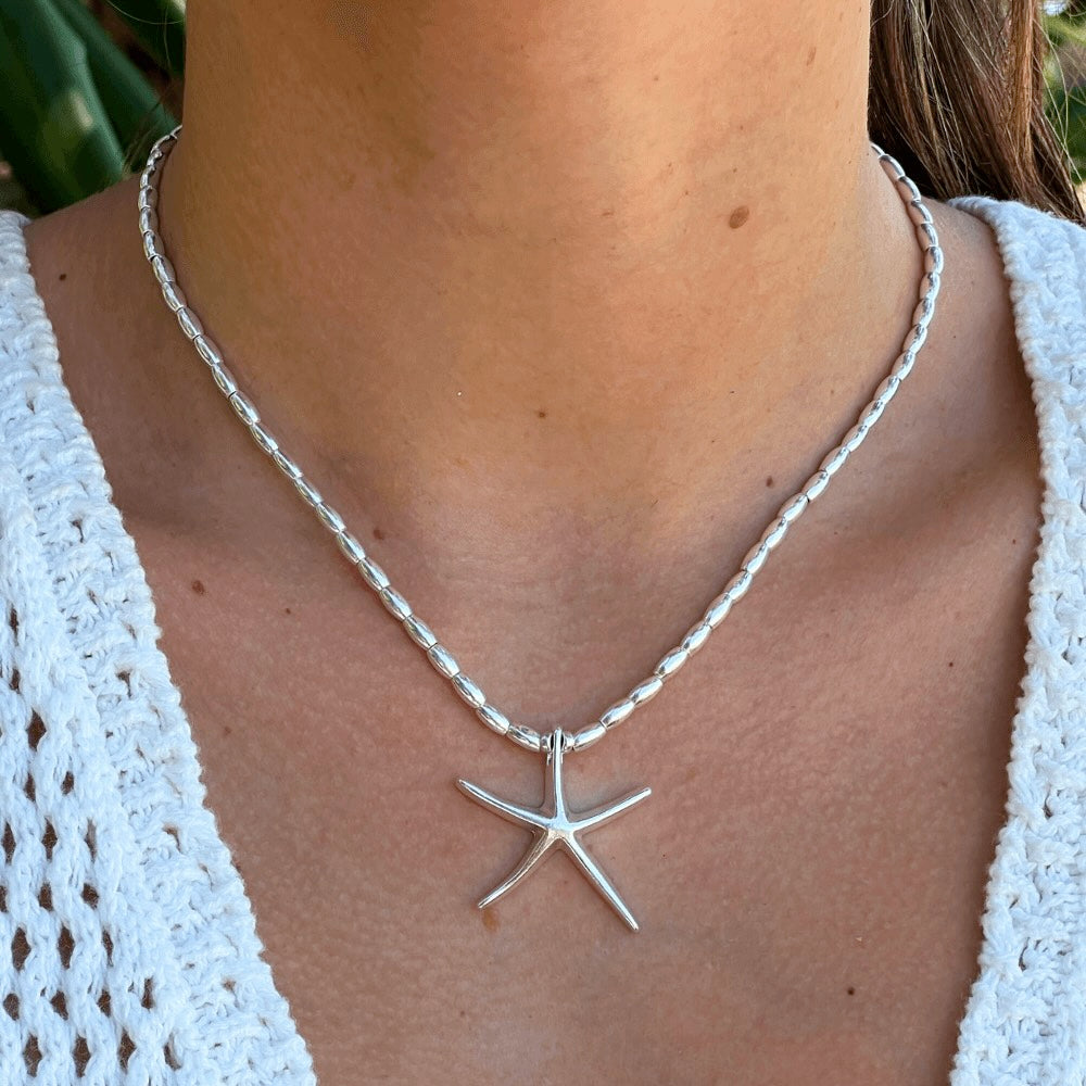This Starfish Sterling Silver Beaded Necklace is a beautiful and unique piece of jewelry. Handmade in Australia, the necklace features intricate sterling silver beads and a starfish charm that sparkles and shines. Perfect for everyday wear or special occasions, this necklace is sure to become a treasured piece for years to come.