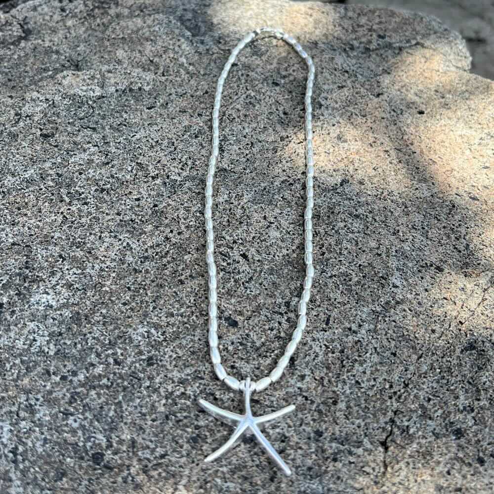 This Starfish Sterling Silver Beaded Necklace is a beautiful and unique piece of jewelry. Handmade in Australia, the necklace features intricate sterling silver beads and a starfish charm that sparkles and shines. Perfect for everyday wear or special occasions, this necklace is sure to become a treasured piece for years to come.