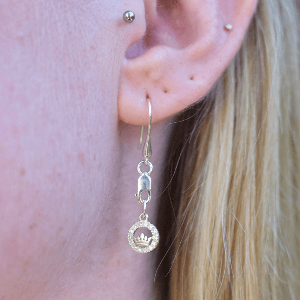 But it's not just the stunning design that sets these earrings apart. The lobster clasp and teardrop hook style make these earrings incredibly easy to wear and remove, ensuring that you can wear them comfortably all day long. And, these earrings are perfect for both men and women, so no one has to miss out on the regal charm they bring.