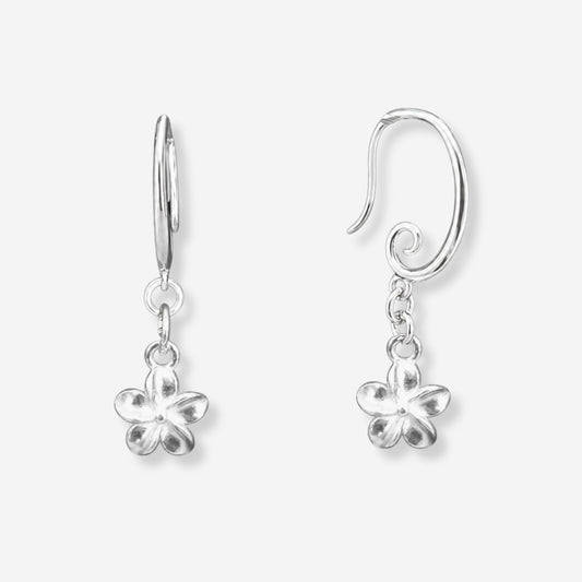 Silver flower-shaped earrings on a white background