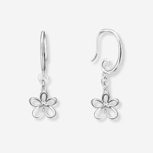 Silver flower-shaped earrings on a light gray background