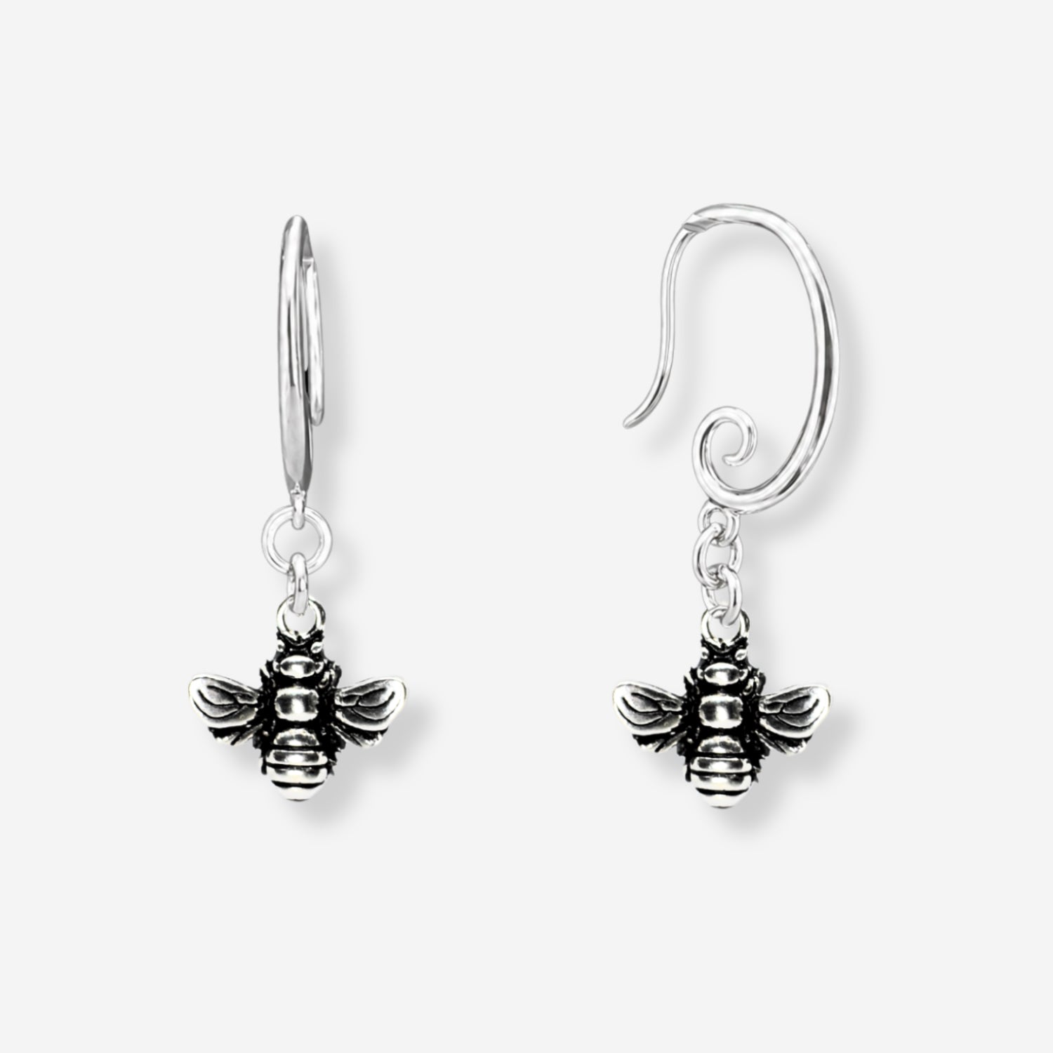 Silver bee-shaped earrings on a white background