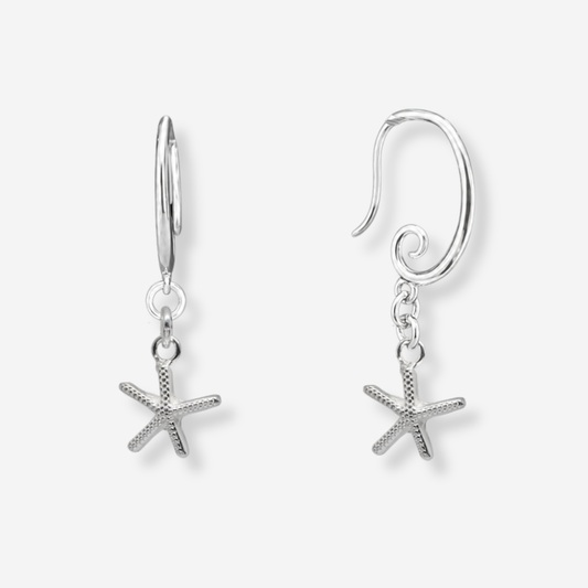 Silver starfish earrings on a light gray background