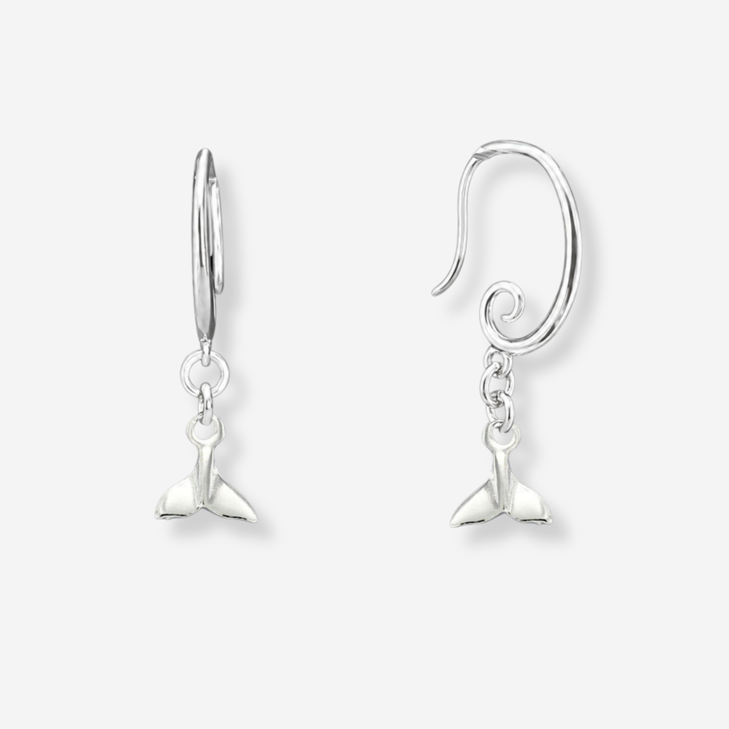 Silver earrings with a subtle design on a white background