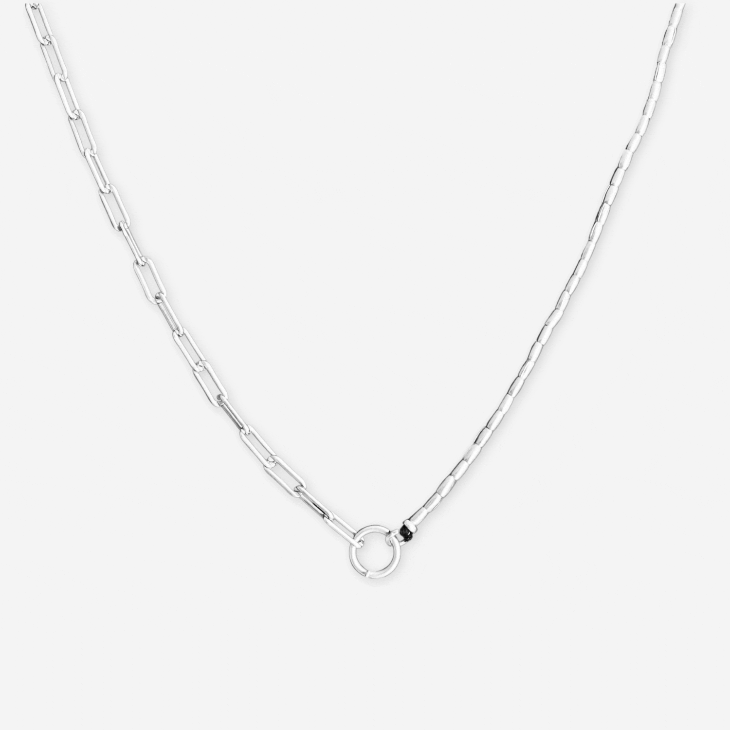 silver chain necklace with charms on white background