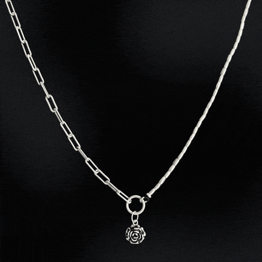A stunning piece of jewellery that combines the best of both worlds. Made from 925 sterling silver, this necklace features a unique design that incorporates a half paperclip chain and half Hill tribe silver beads. The result is a beautifully balanced piece that is both elegant and modern. The necklace also features a beautiful rose charm made of sterling silver that sits perfectly in the centre of the piece.