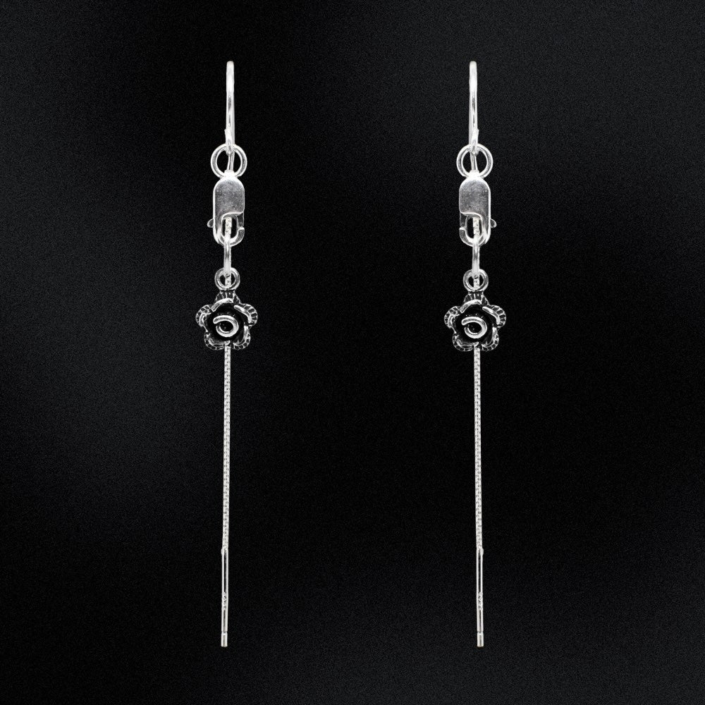 These Sterling Silver Rose Threader Earrings are a beautiful addition to any jewellery collection. Made with high-quality sterling silver, these earrings are both elegant and durable. The unique threader design allows for easy wear and a comfortable fit. Enhance your style with these timeless earrings that are perfect for any occasion.