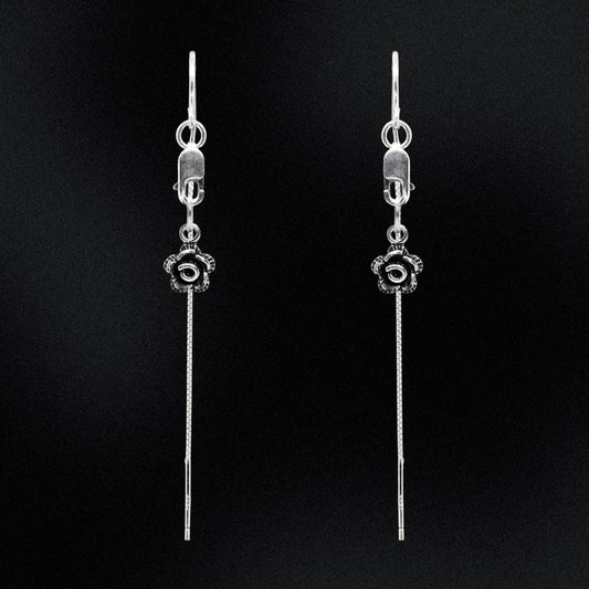 These Sterling Silver Rose Threader Earrings are a beautiful addition to any jewellery collection. Made with high-quality sterling silver, these earrings are both elegant and durable. The unique threader design allows for easy wear and a comfortable fit. Enhance your style with these timeless earrings that are perfect for any occasion.