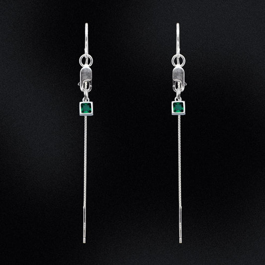 Introducing our Evergreen Thread Earrings! These gorgeous earrings feature delicate threads that dangle from a sleek and secure lobster clasp, adding a touch of elegance to any outfit. The earrings are adorned with a beautiful green square charm, adding a pop of colour that is sure to turn heads.