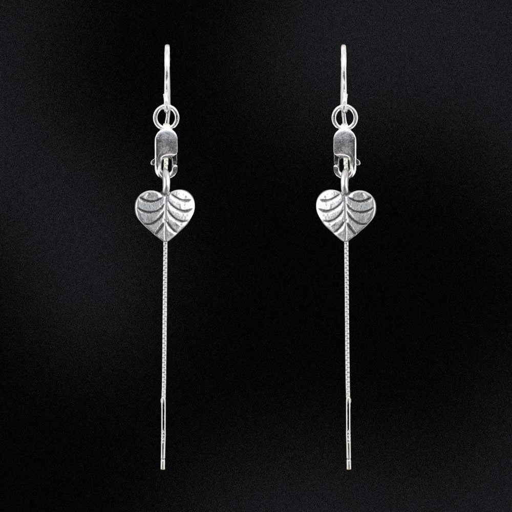 Love nature? Get ready to fall head-over-heels for our Heart-Shaped Leaf Threaders! Crafted from genuine sterling silver, these eye-catching earrings will add a subtle touch of romance to any look. They're lightweight and airy, so you can show off your boho-style without weighing yourself down. Plus, they make a great gift for the nature-loving fashionista in your life.