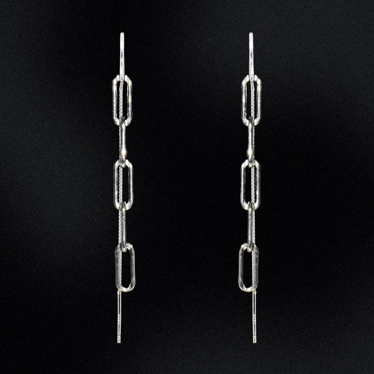 The perfect statement piece for your accessory collection! These earrings boast a stunning design that's sure to catch everyone's eye. The paperclip chain is a stylish yet subtle detail, creating a sleek and contemporary feel. ﻿ Crafted with high-quality silver, these earrings are both lightweight and durable, ensuring maximum comfort throughout the day. The chain is attached to a secure and easy-to-use threader that allows for an effortless insertion into your earlobe.