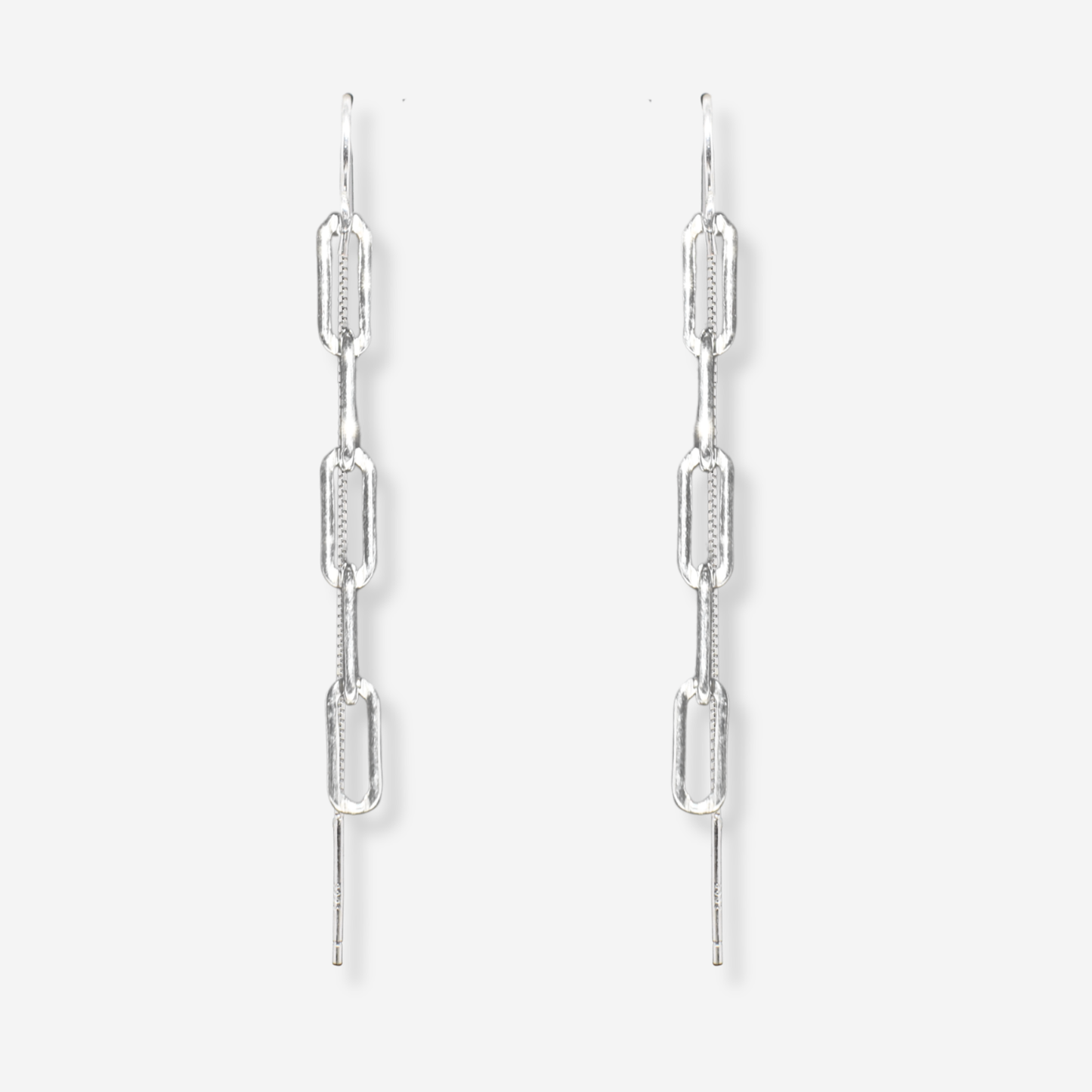Pair of silver chain link earrings on a white background