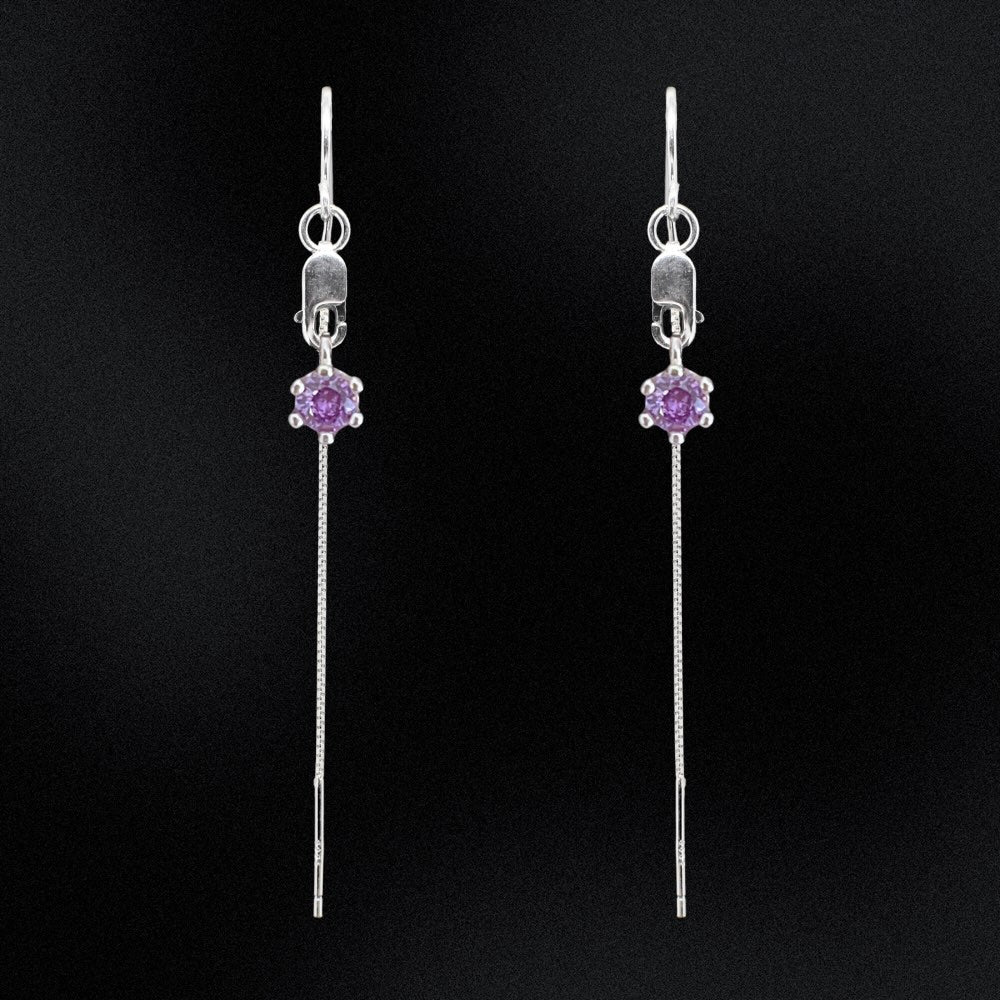 Add flare and passion to your jewellery collection with our Purple CZ Sterling Silver Threader Earrings! Made from high-quality sterling silver, these versatile earrings feature tiny purple cubic zirconia charms for a touch of warmth and energy. Perfect for any free-spirited, passionate individual.