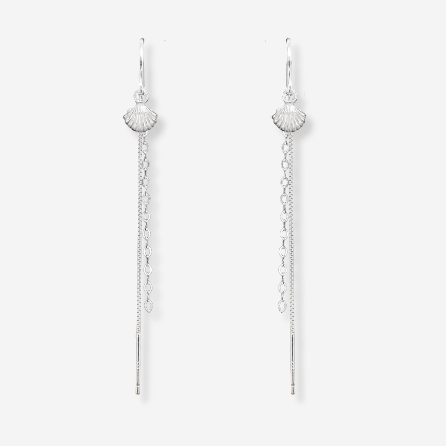 Silver chain earrings with scallop shell designs on a white background