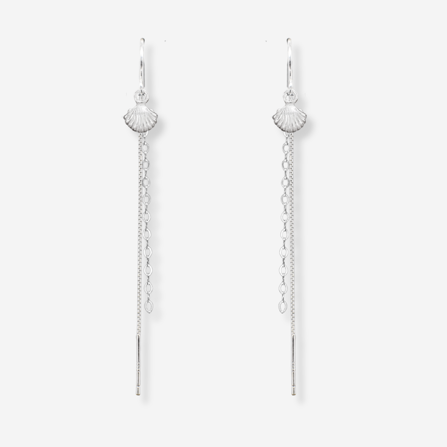 Silver chain earrings with scallop shell designs on a white background