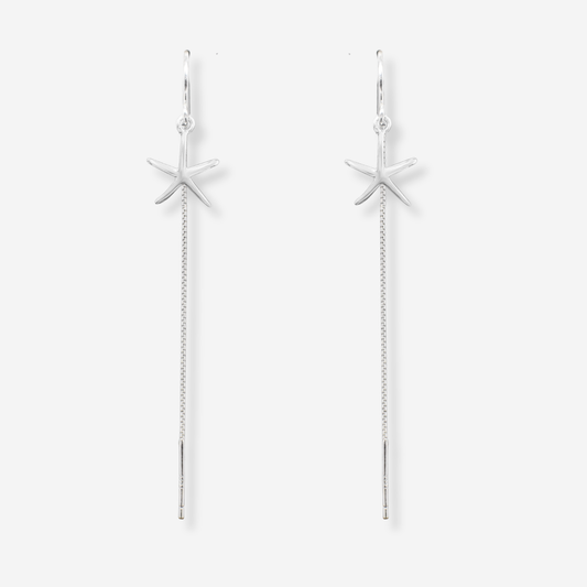 Starfish-shaped earrings with chain details on a white background