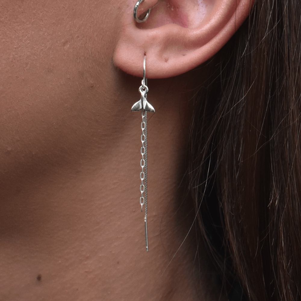The stunning whale tail design evokes the essence of the majestic sea creature - an embodiment of freedom and grace. It signifies strength, good luck, and resilience. These earrings are not only an accessory to enhance your appearance but also a statement piece that reflects your spirit and values.