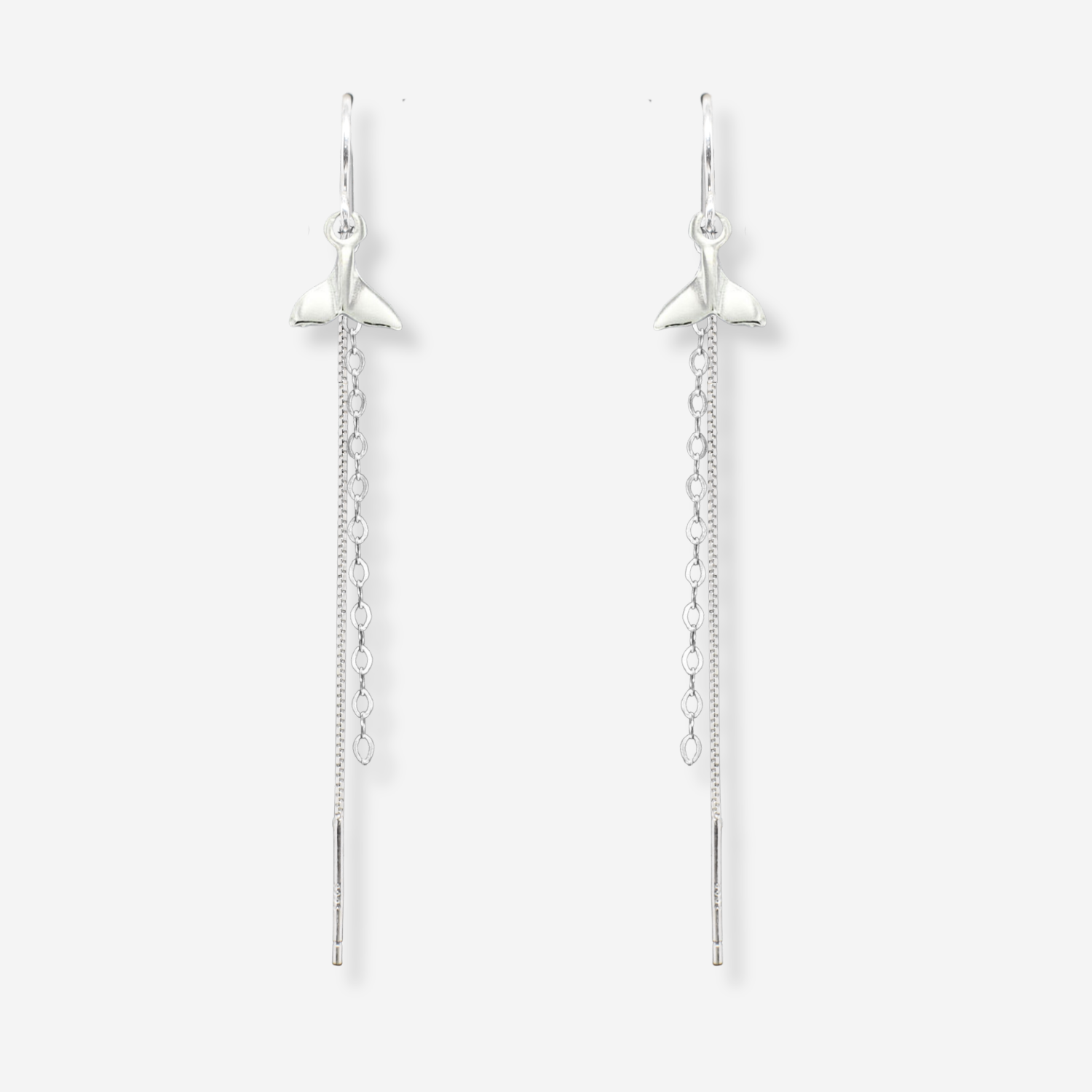 Pair of silver star-shaped earrings on a white background