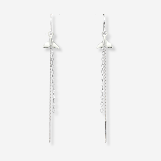 Pair of silver star-shaped earrings on a white background