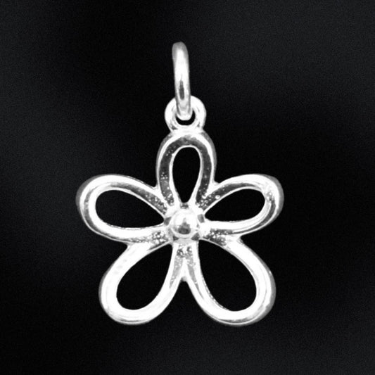 Silver flower-shaped pendant on a black background