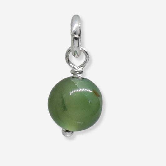 Green bead pendant with silver chain on a white background