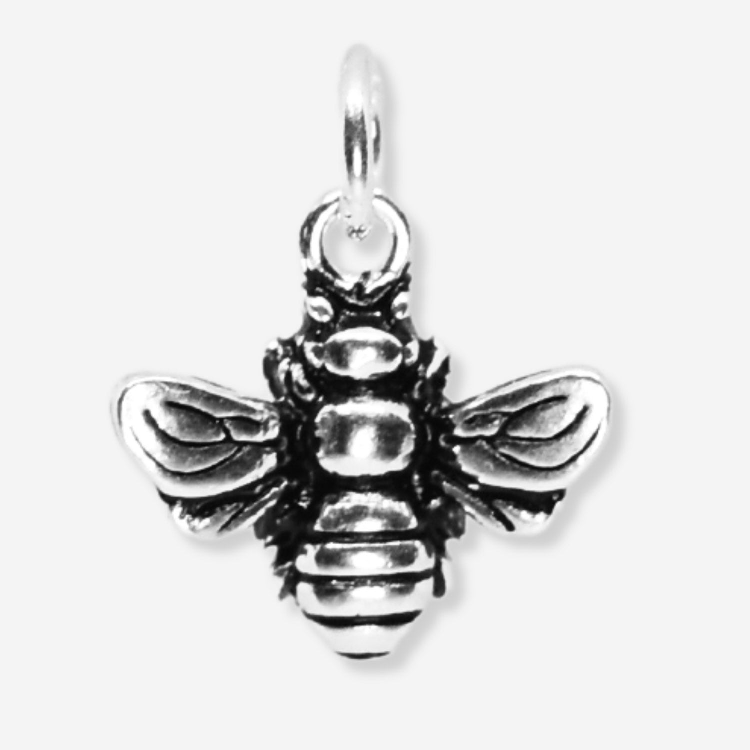 Silver bee pendant on a white background