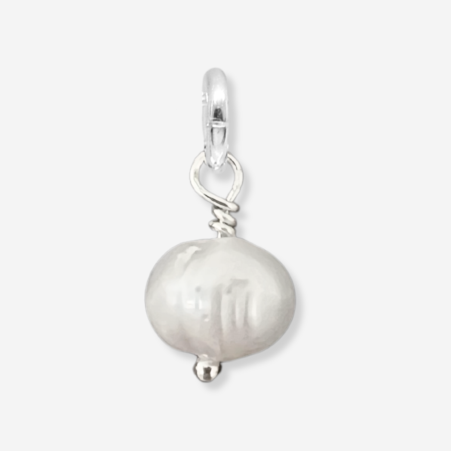 Silver pendant with a large pearl on a light gray background