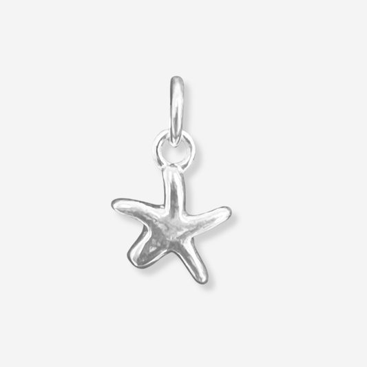 Silver starfish pendant on a light gray background
