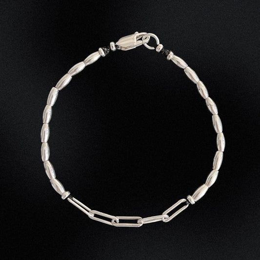The ultimate fashion statement that effortlessly elevates any outfit! Handcrafted to perfection, this bracelet boasts of delicate sterling silver beads that beautifully sit around your wrist, giving you an exquisite and timeless look.