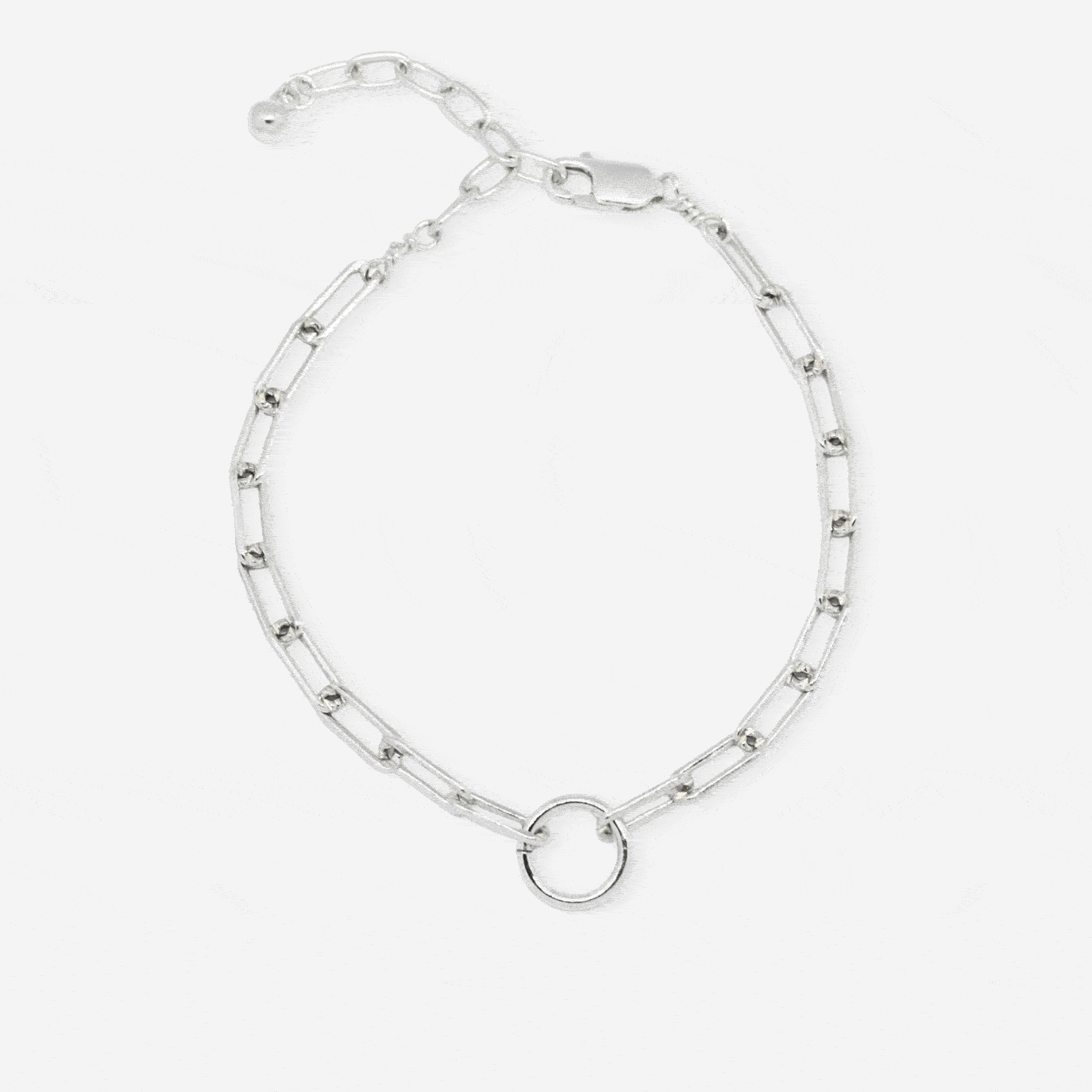 silver chain bracelet with charms on white background