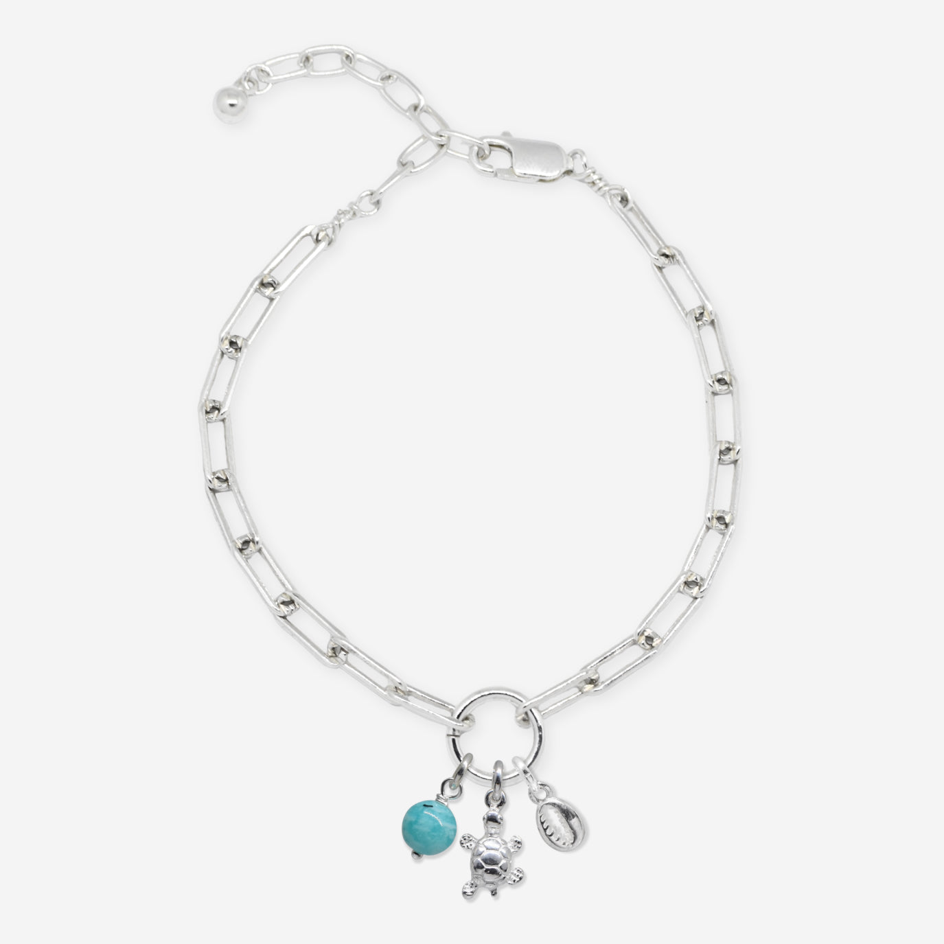 Silver bracelet with charms on a white background