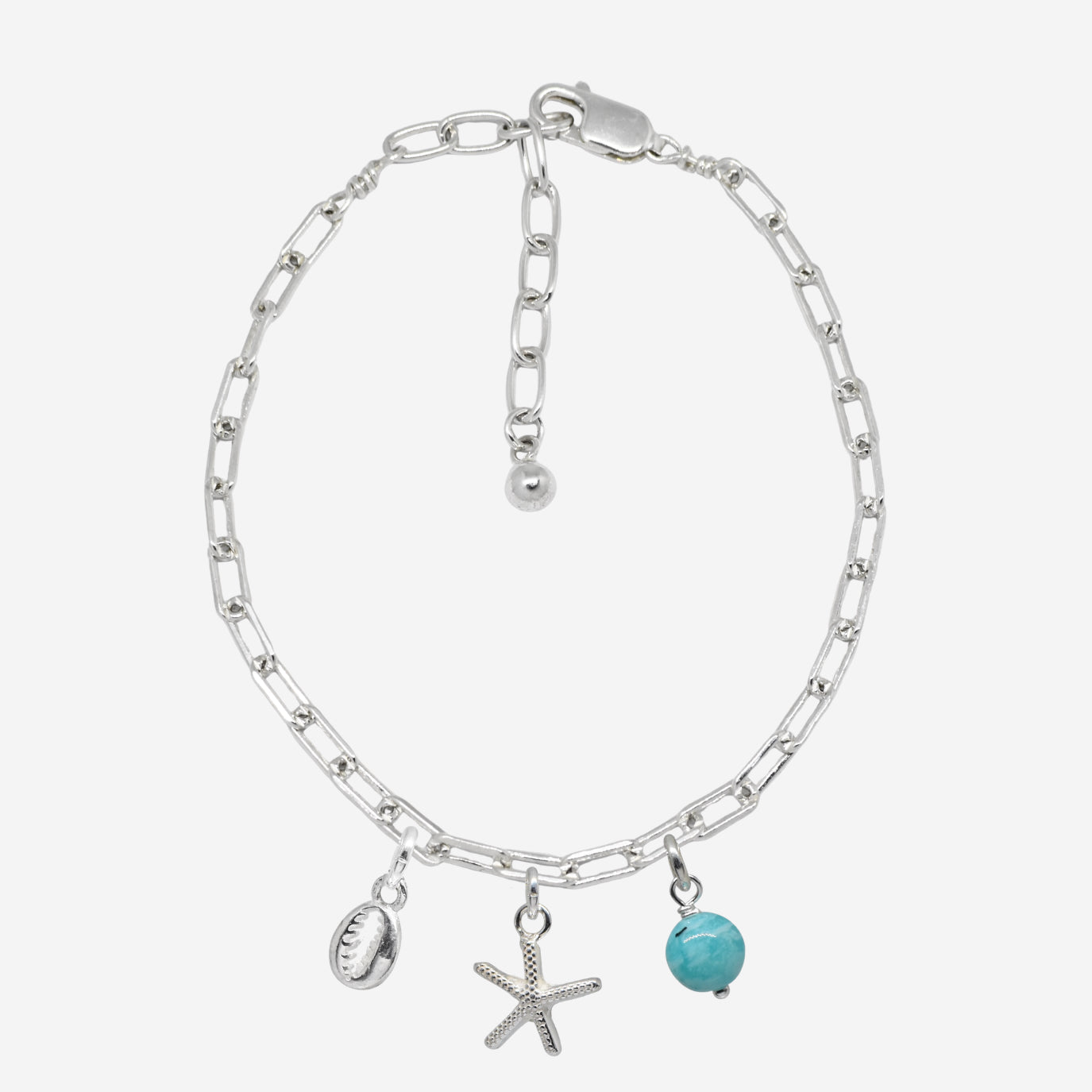 Silver chain bracelet with charms on a white background
