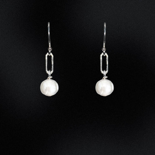 Stand out with these stylish and unique Paperclip Link & Freshwater Pearl Earrings. Handcrafted in Australia with 925 sterling silver, these earrings offer a subtle yet sophisticated look to complete any outfit. Dare to be different and add these to your collection today!