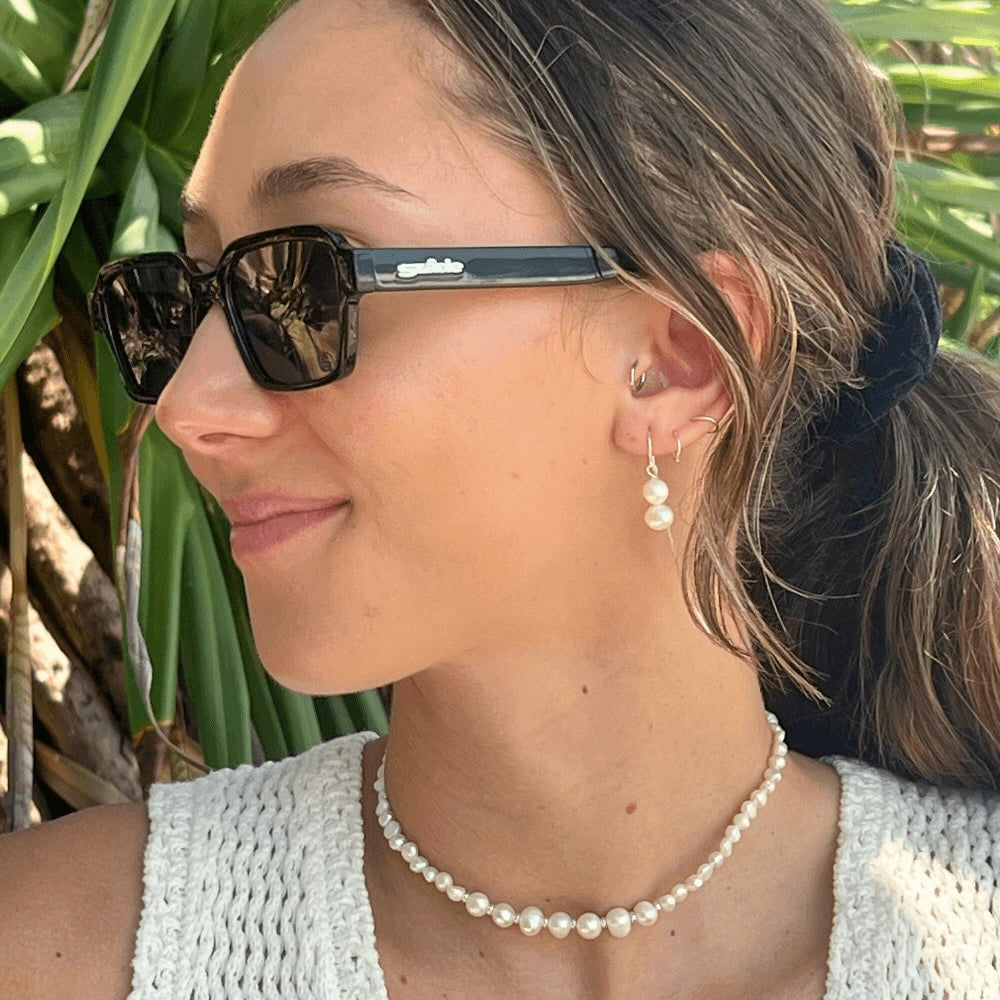 These Double Pearl Stack Threader Earrings are a stunning addition to any jewellery collection! Handcrafted in Australia with sterling silver, these earrings are perfect for any occasion. Exquisite, sophisticated, and stylish, these earrings will add a luxurious sparkle to any ensemble!