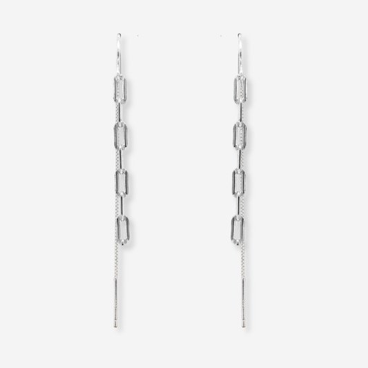 Pair of silver chain earrings on a light gray background